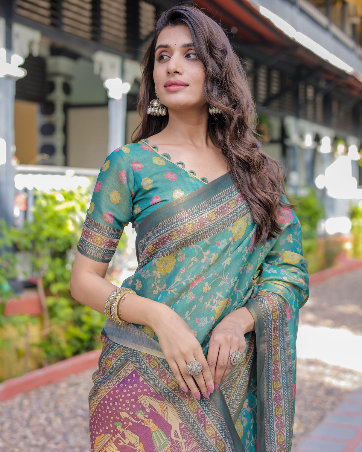 Sea green handloom cotton saree with multicolor floral royal procession pallu