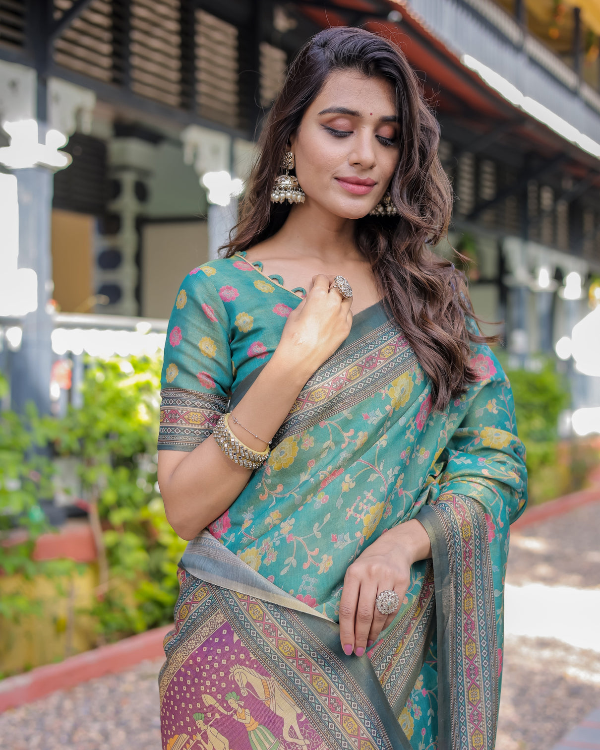 Sea green handloom cotton saree with multicolor floral royal procession pallu