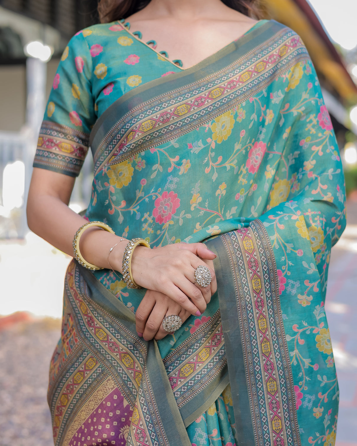 Sea green handloom cotton saree with multicolor floral royal procession pallu