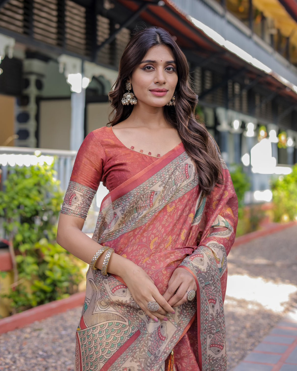 Rust red madhubani fish art pure handloom cotton saree with contrast blouse tassels