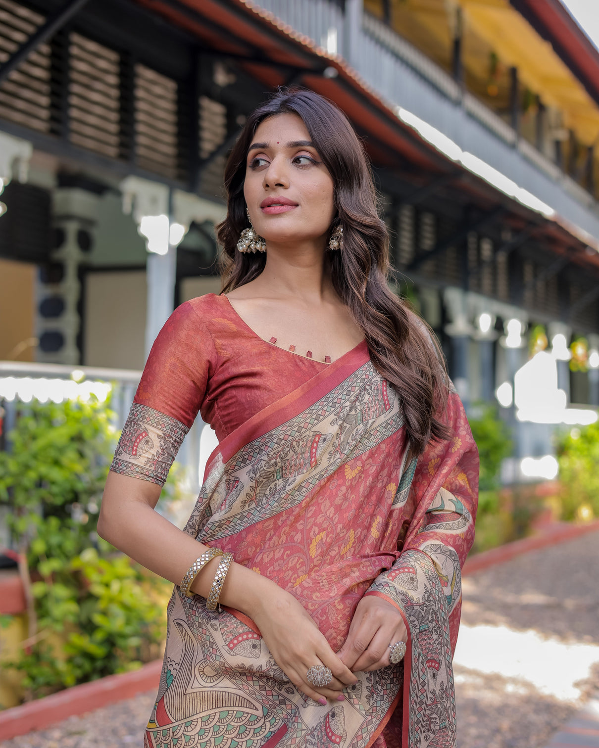 Rust red madhubani fish art pure handloom cotton saree with contrast blouse tassels