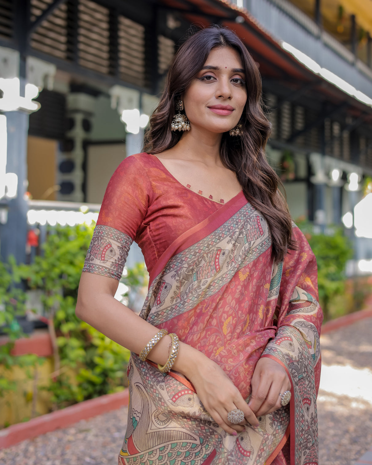 Rust red madhubani fish art pure handloom cotton saree with contrast blouse tassels