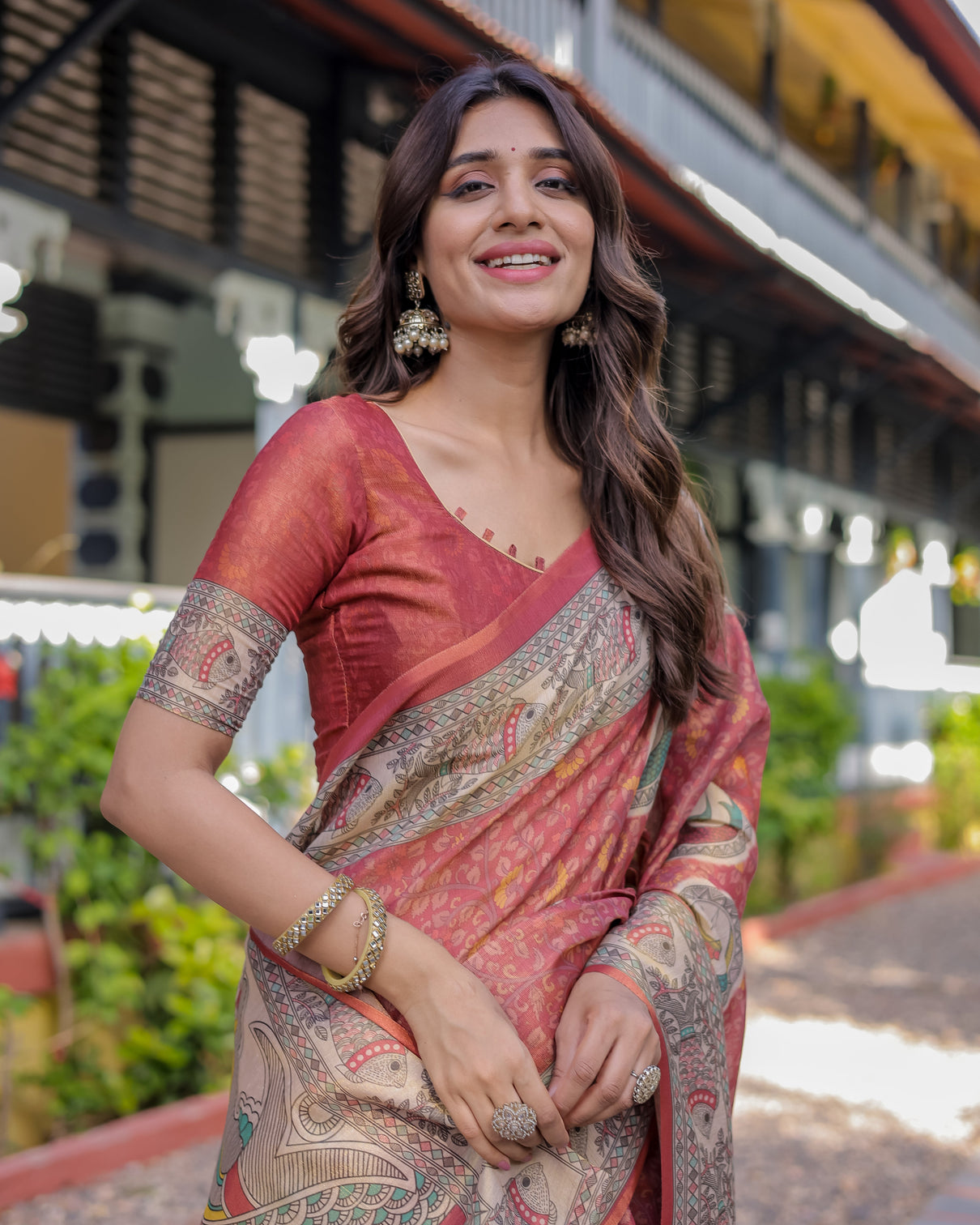 Rust red madhubani fish art pure handloom cotton saree with contrast blouse tassels