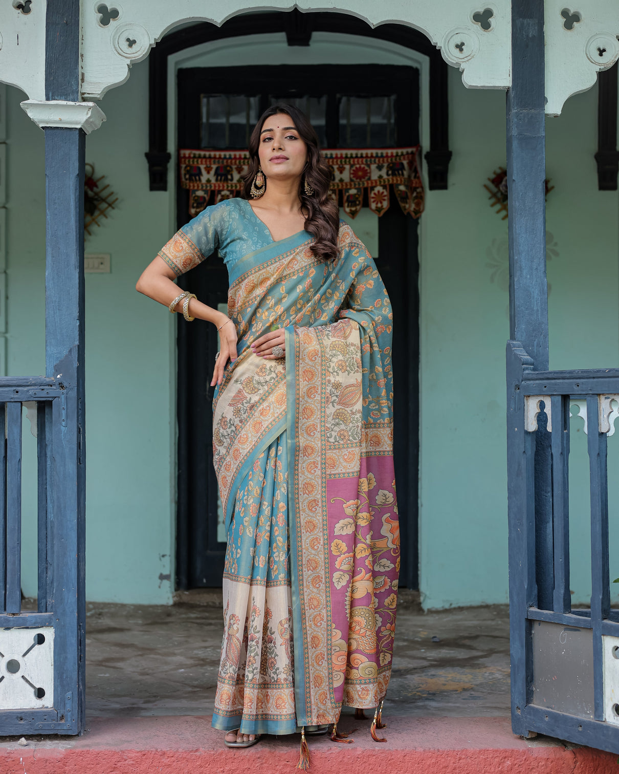 Turquoise blue handloom cotton saree with multicolor floral pallu peach border mameraa