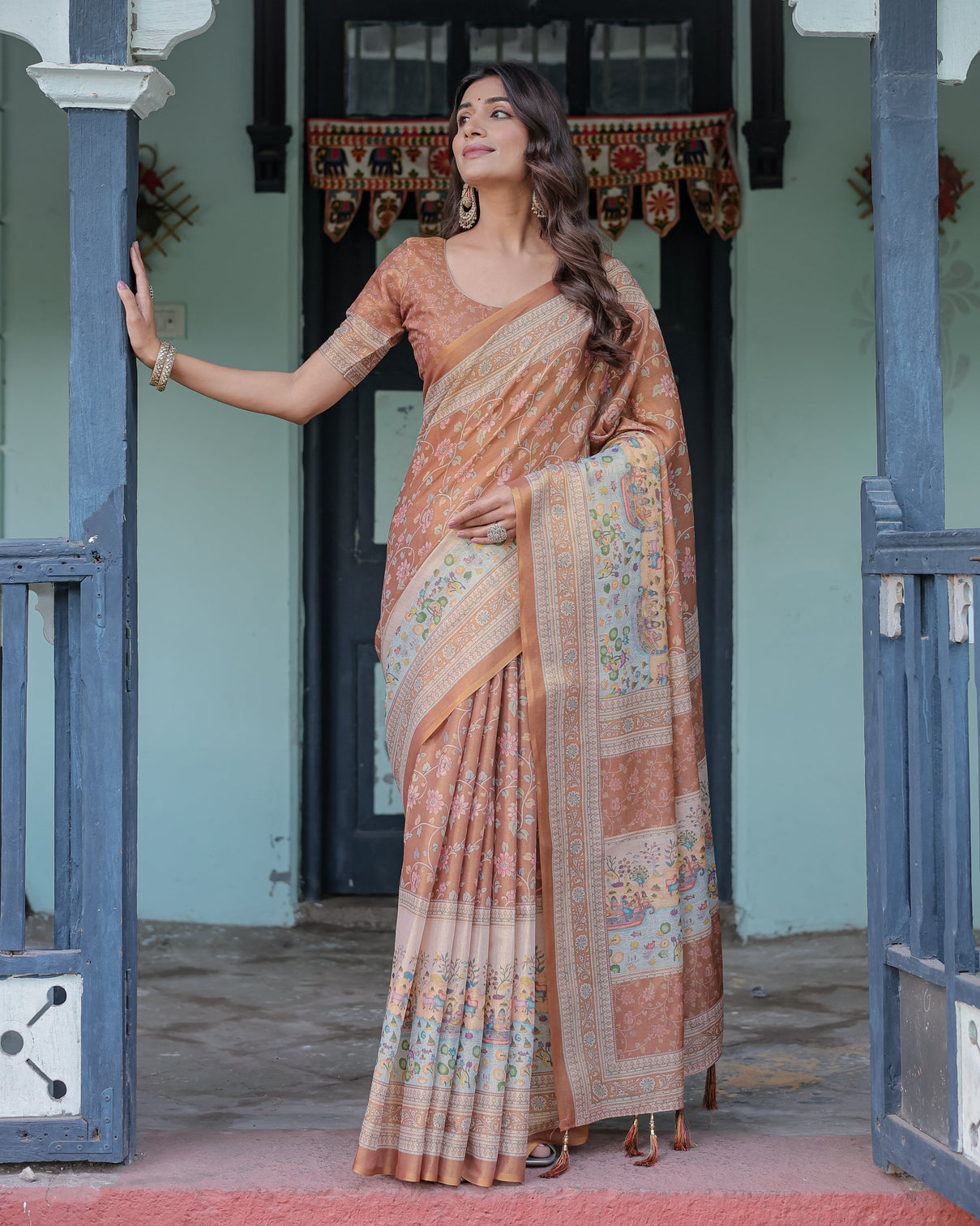 Burnt peach handloom cotton saree with floral buta design village scene pallu mameraa