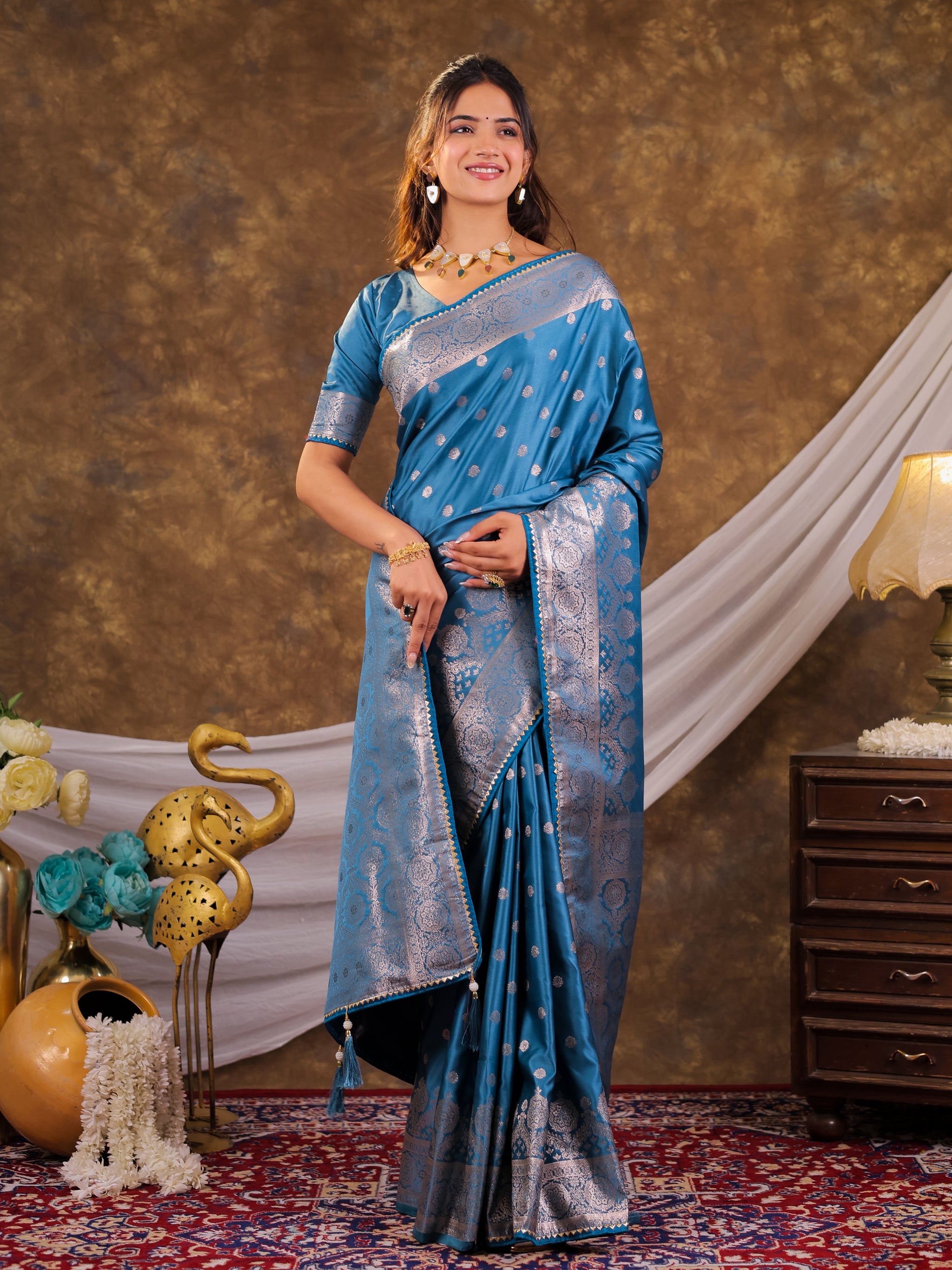 Turquoise Blue Kanjivaram Banarasi Satin Silk Saree with Antique Silver Zari Weaving, Rich Heritage Pallu & Tassel Detailing
