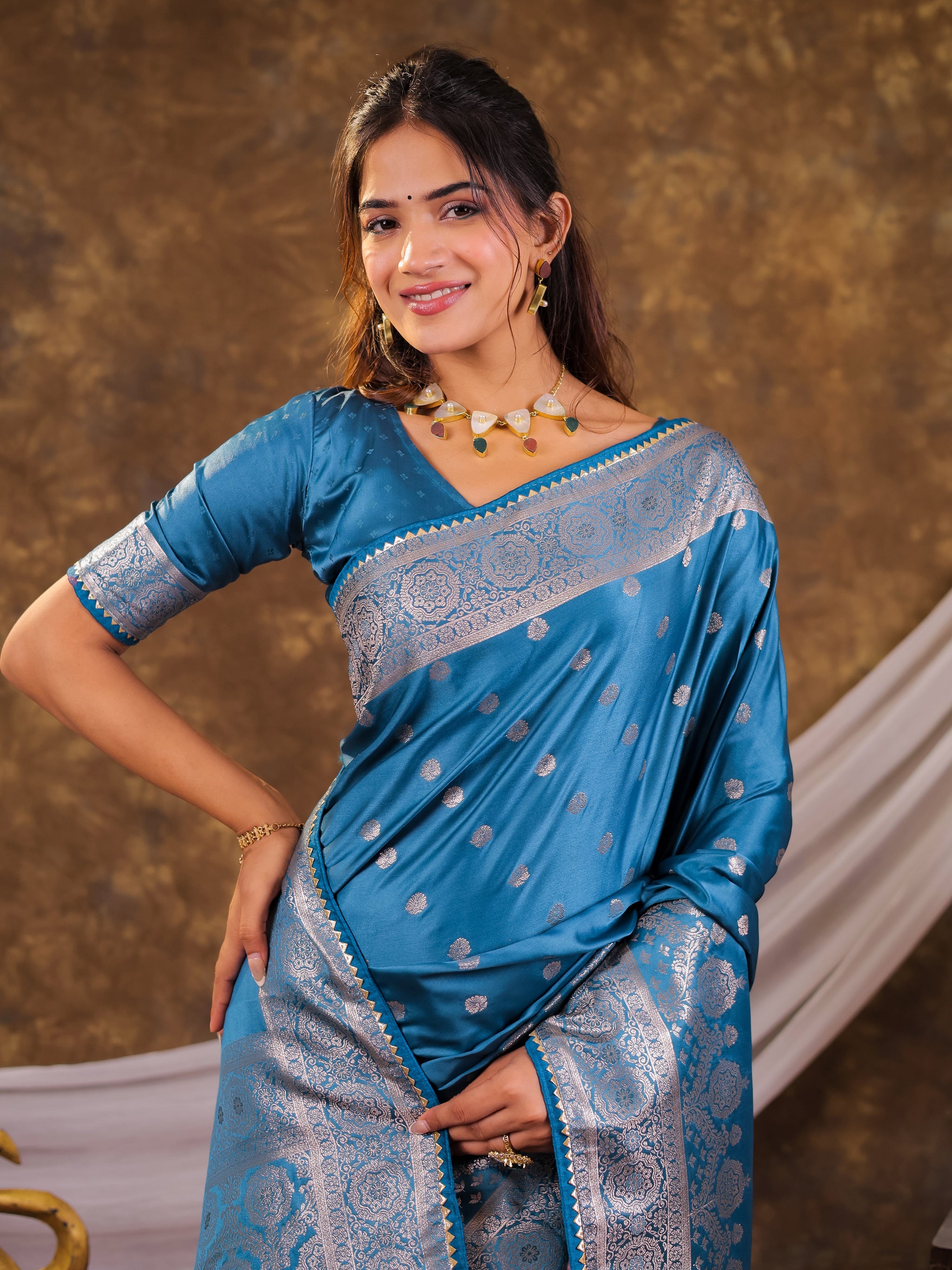 Turquoise Blue Kanjivaram Banarasi Satin Silk Saree with Antique Silver Zari Weaving, Rich Heritage Pallu & Tassel Detailing