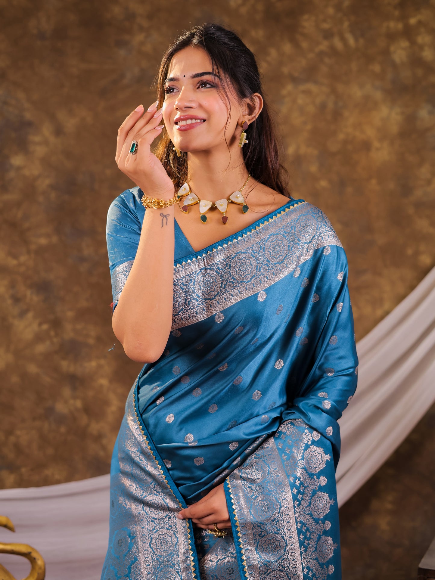 Turquoise Blue Kanjivaram Banarasi Satin Silk Saree with Antique Silver Zari Weaving, Rich Heritage Pallu & Tassel Detailing