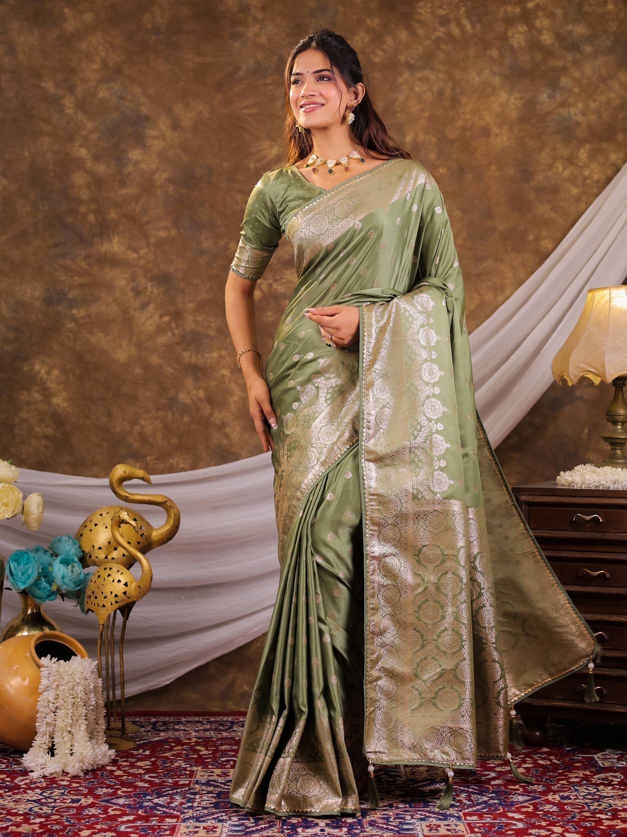 Sage Green Kanjivaram Banarasi Satin Silk Saree with Antique Silver Zari Weaving, Rich Heritage Pallu & Tassel Detailing
