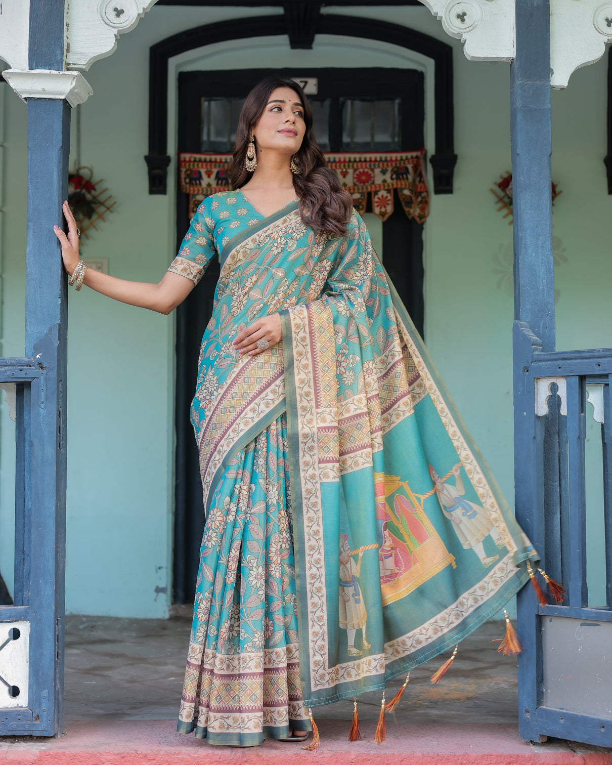 Teal green handloom cotton saree with floral print royal bridal procession pallu