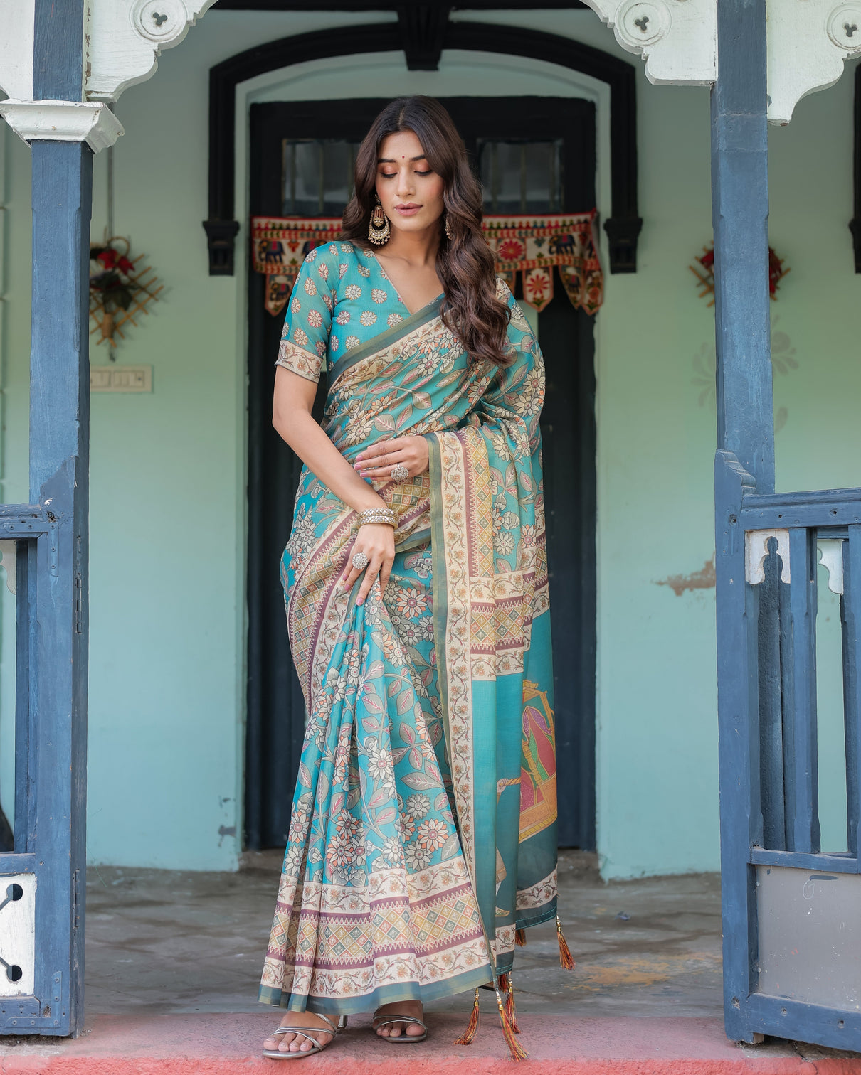 Teal green handloom cotton saree with floral print royal bridal procession pallu mameraa