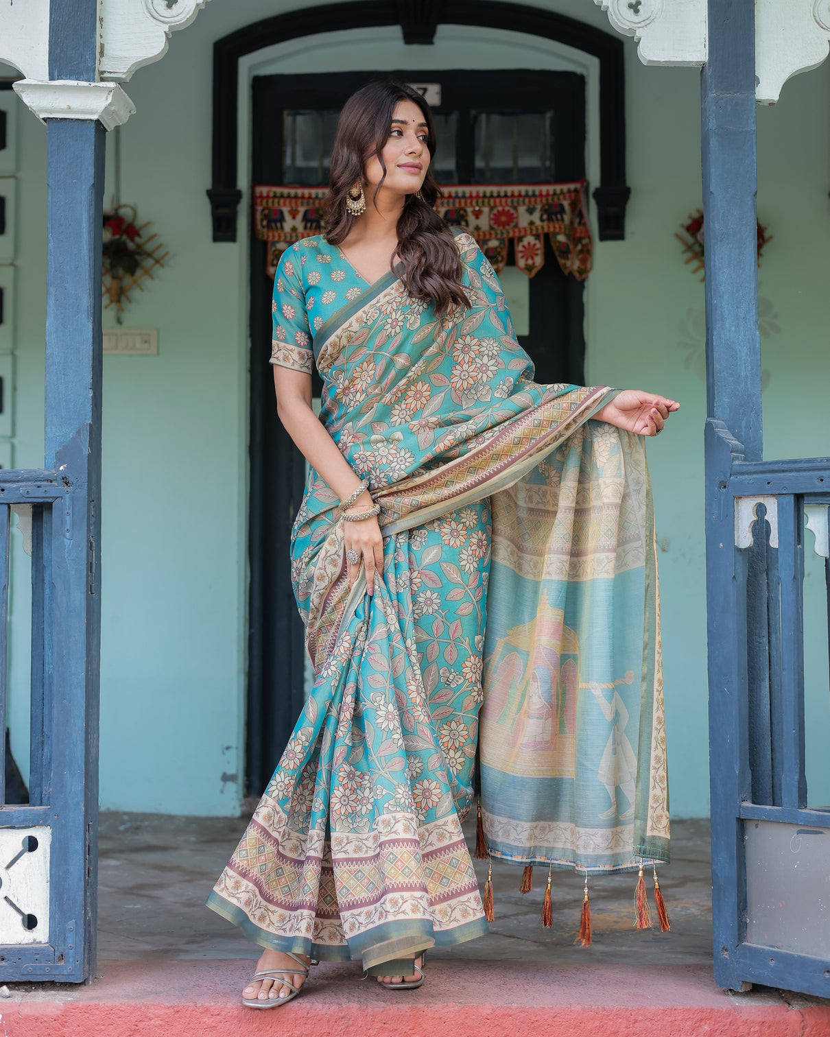 Teal green handloom cotton saree with floral print royal bridal procession pallu