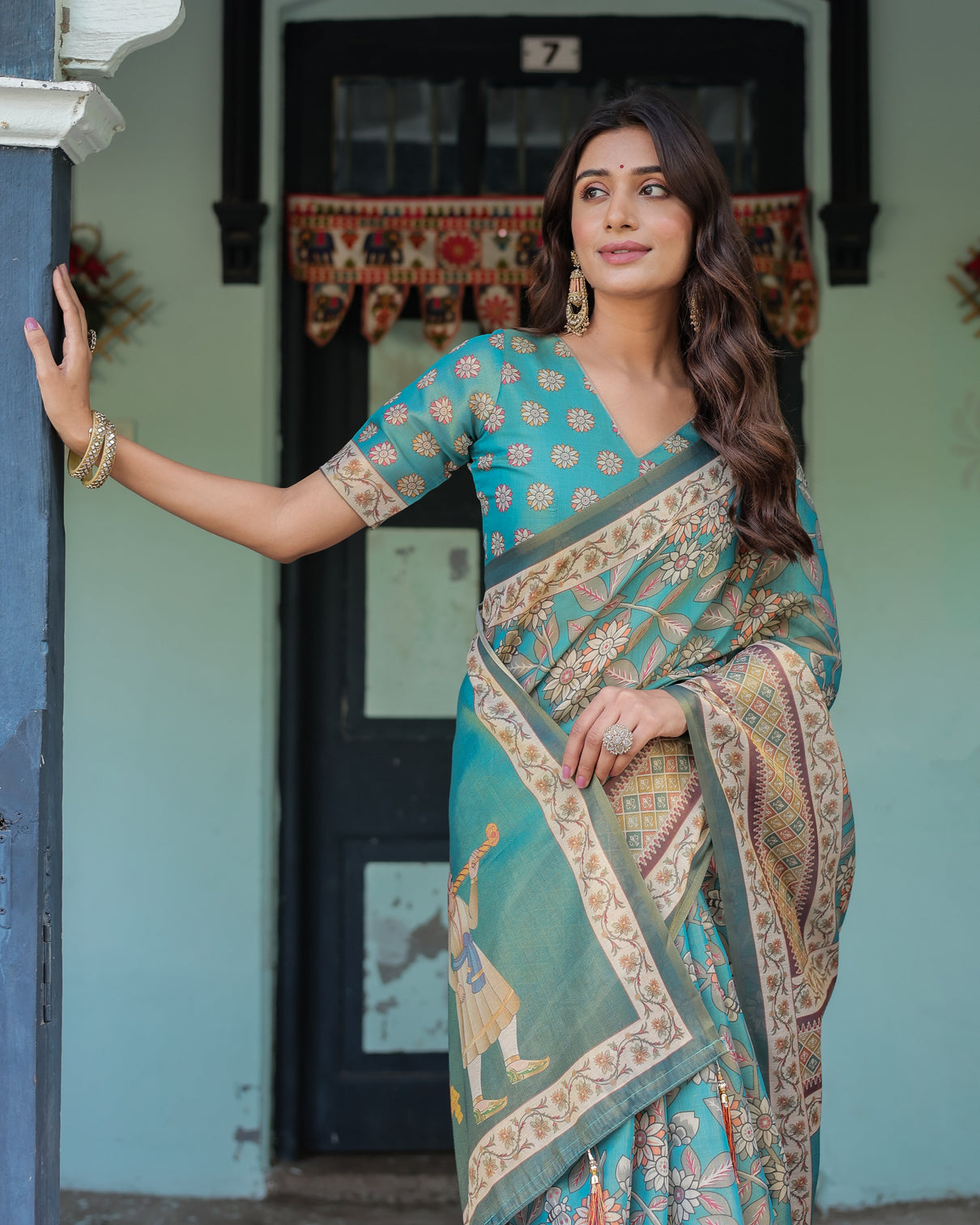 Teal green handloom cotton saree with floral print royal bridal procession pallu