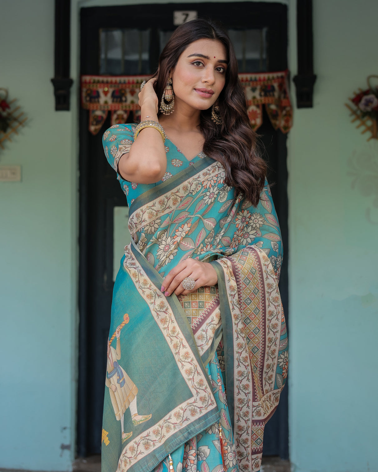 Teal green handloom cotton saree with floral print royal bridal procession pallu