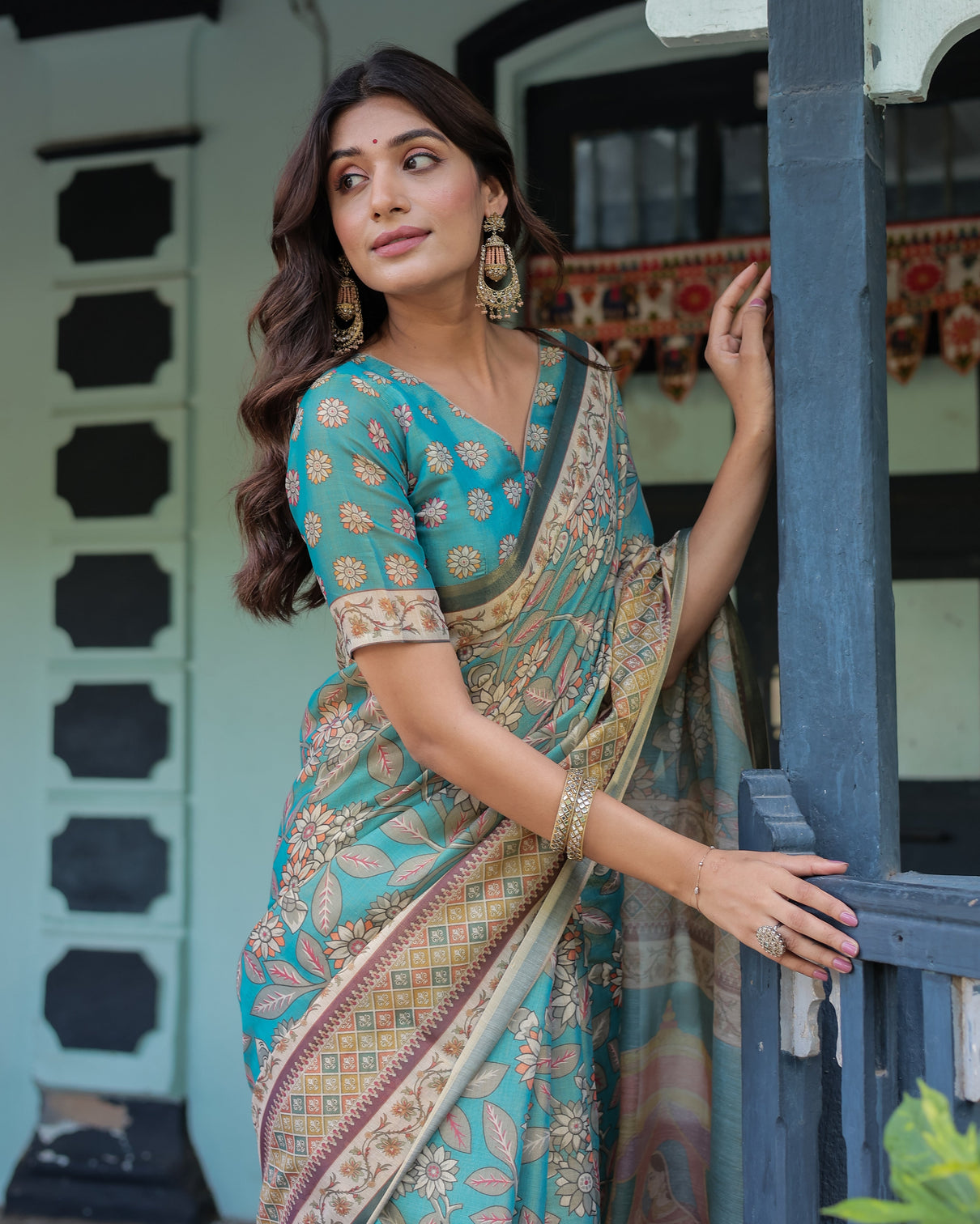 Teal green handloom cotton saree with floral print royal bridal procession pallu