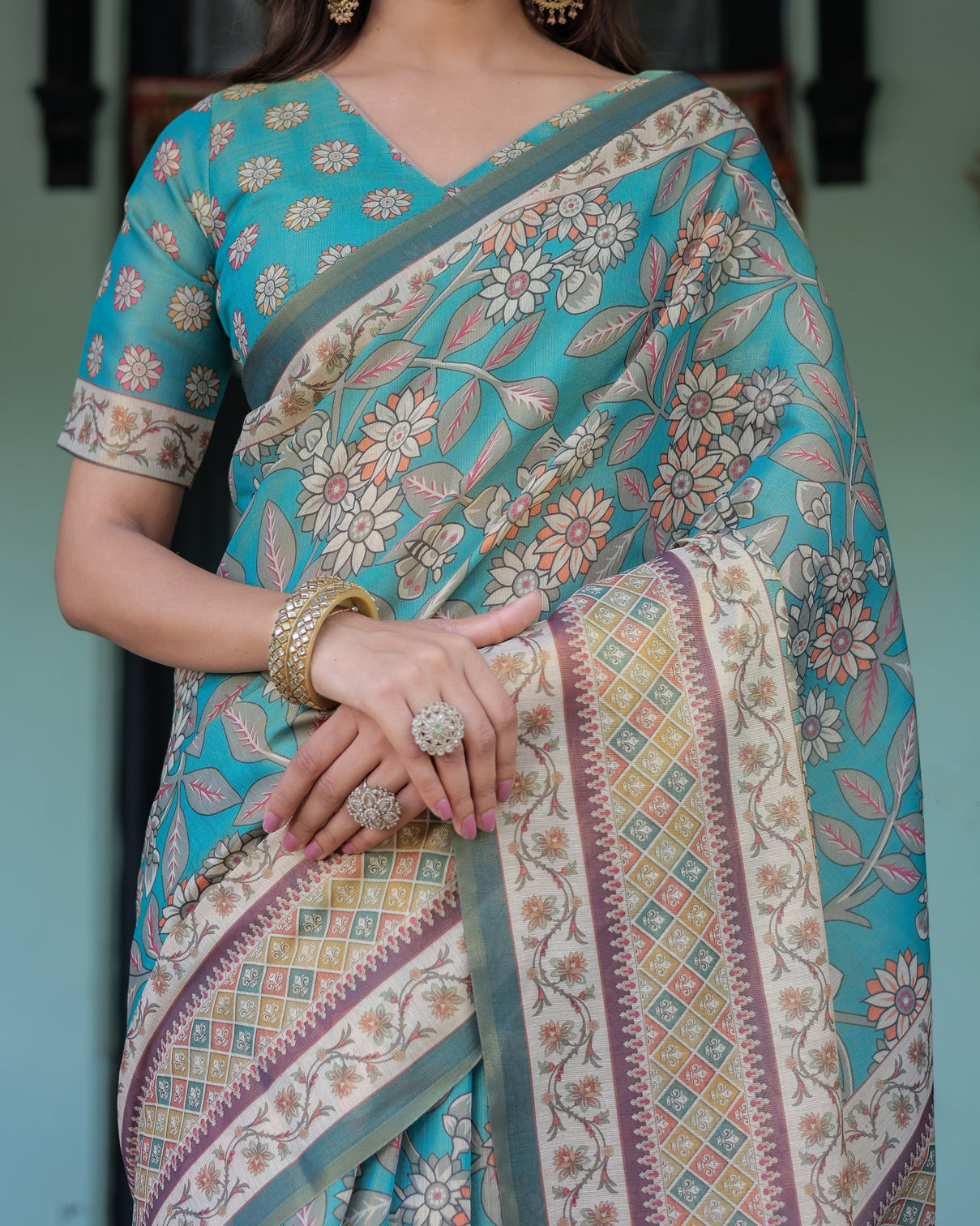 Teal green handloom cotton saree with floral print royal bridal procession pallu