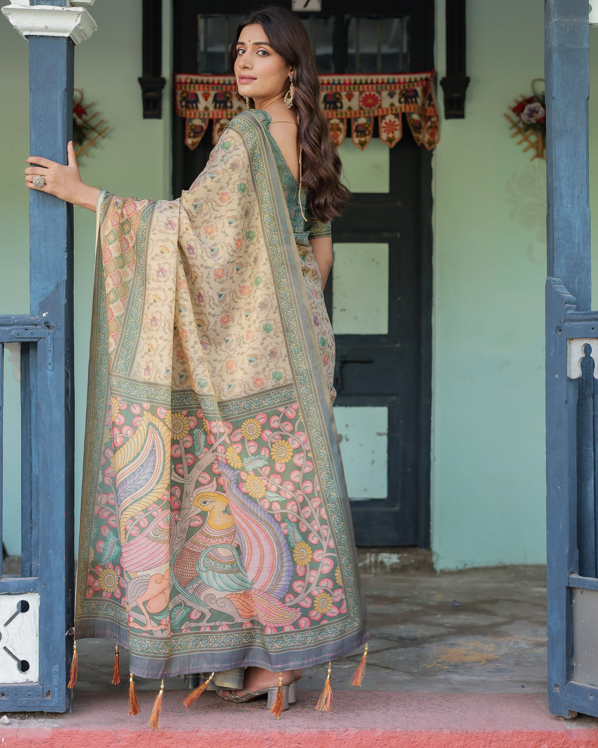Beige green handloom cotton saree with lotus print colorful peacock pallu