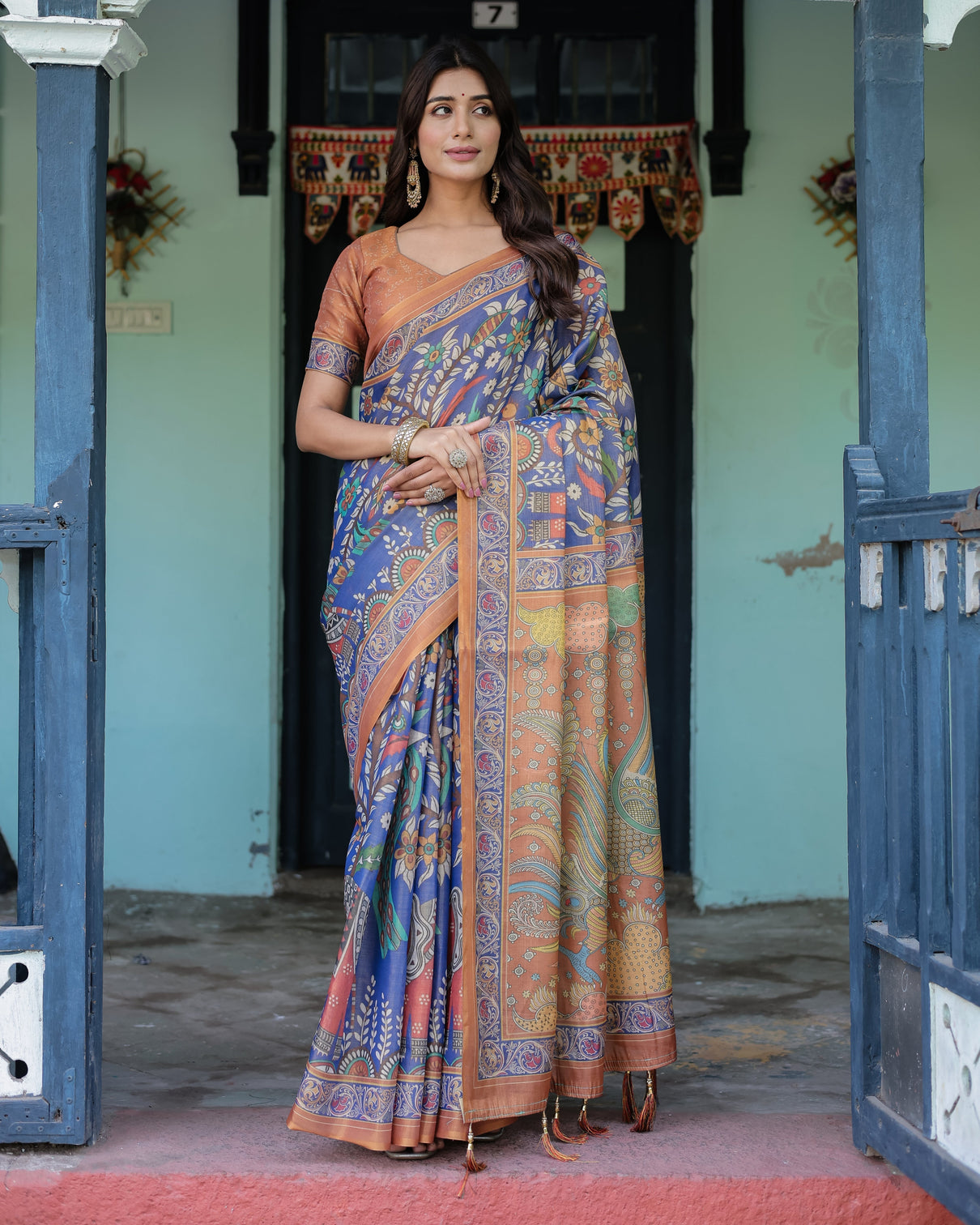 Royal blue rust handloom cotton saree with bold floral print grand peacock pallu mameraa