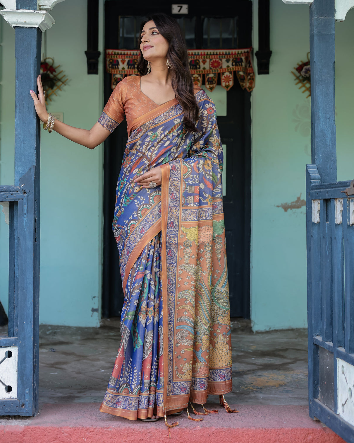 Royal blue rust handloom cotton saree with bold floral print grand peacock pallu