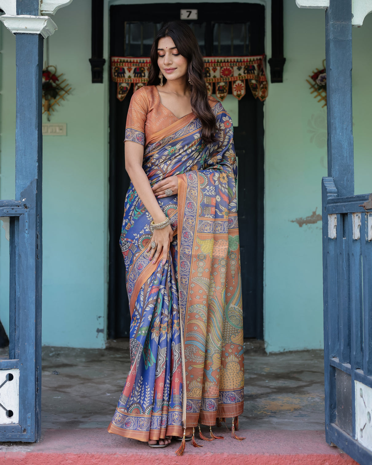 Royal blue rust handloom cotton saree with bold floral print grand peacock pallu