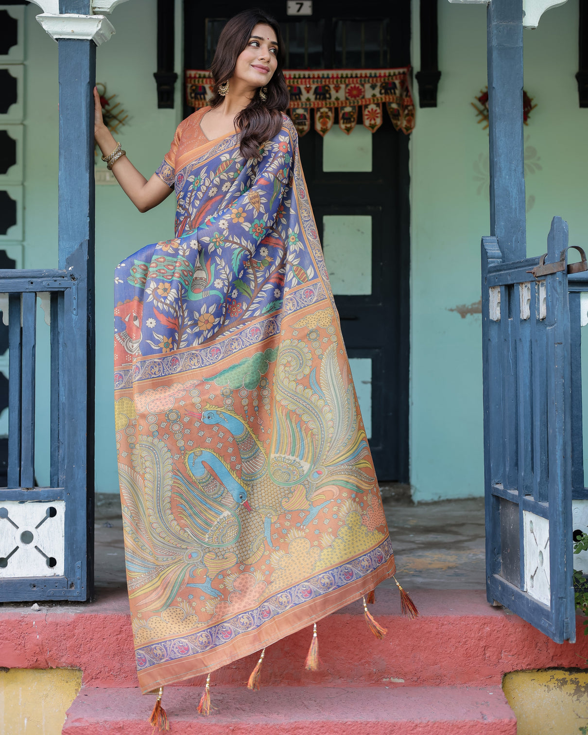 Royal blue rust handloom cotton saree with bold floral print grand peacock pallu