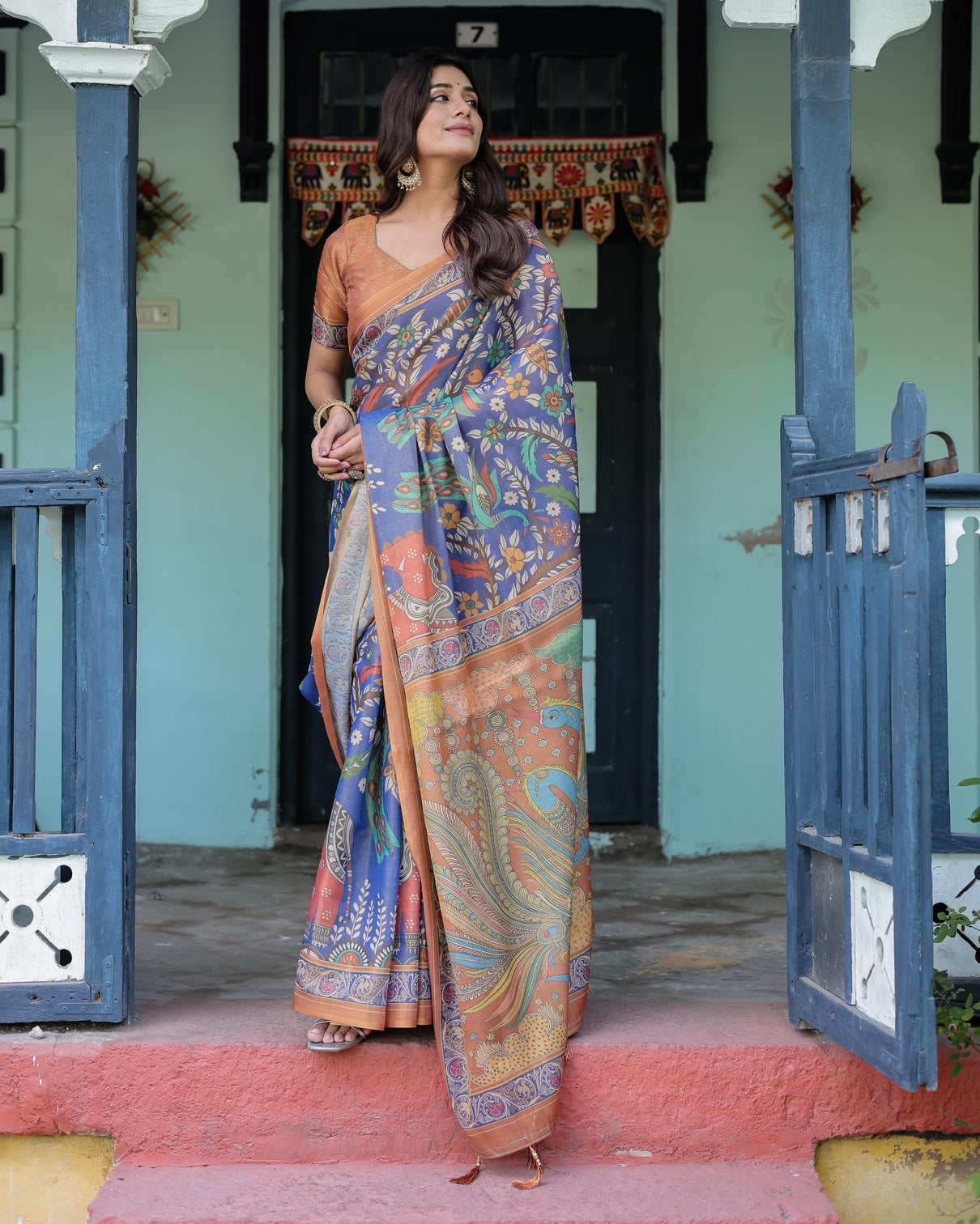 Royal blue rust handloom cotton saree with bold floral print grand peacock pallu