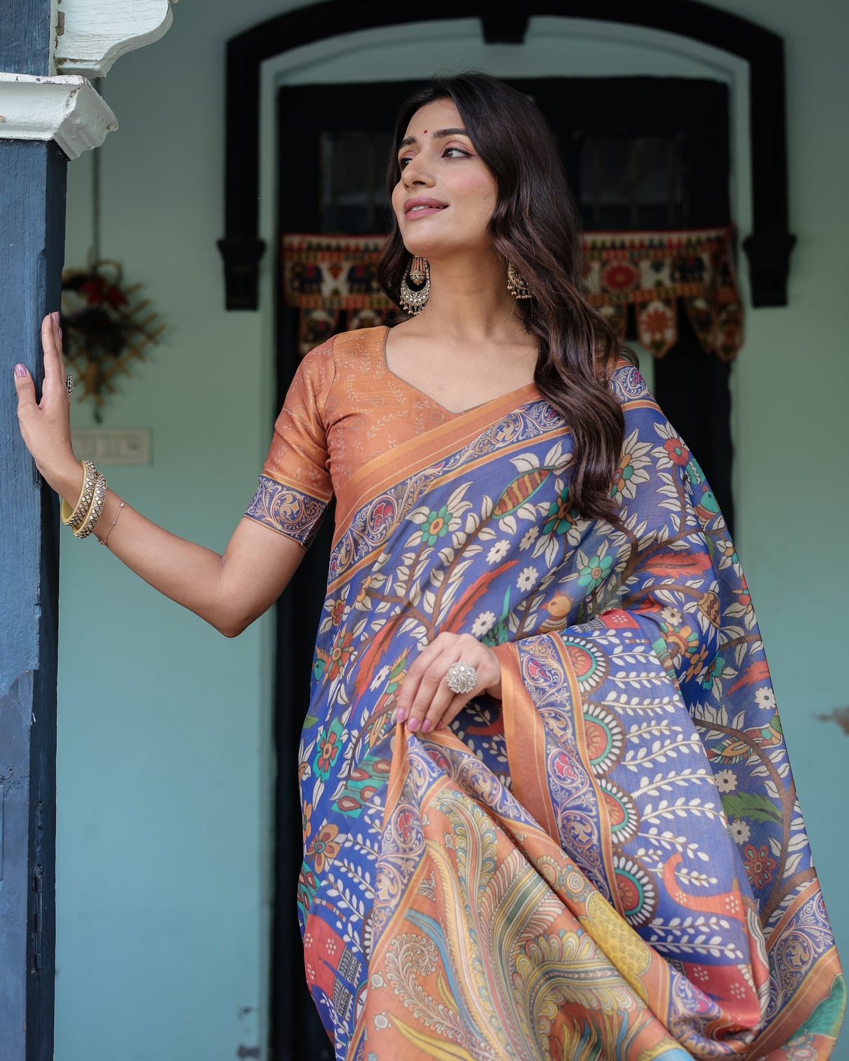 Royal blue rust handloom cotton saree with bold floral print grand peacock pallu