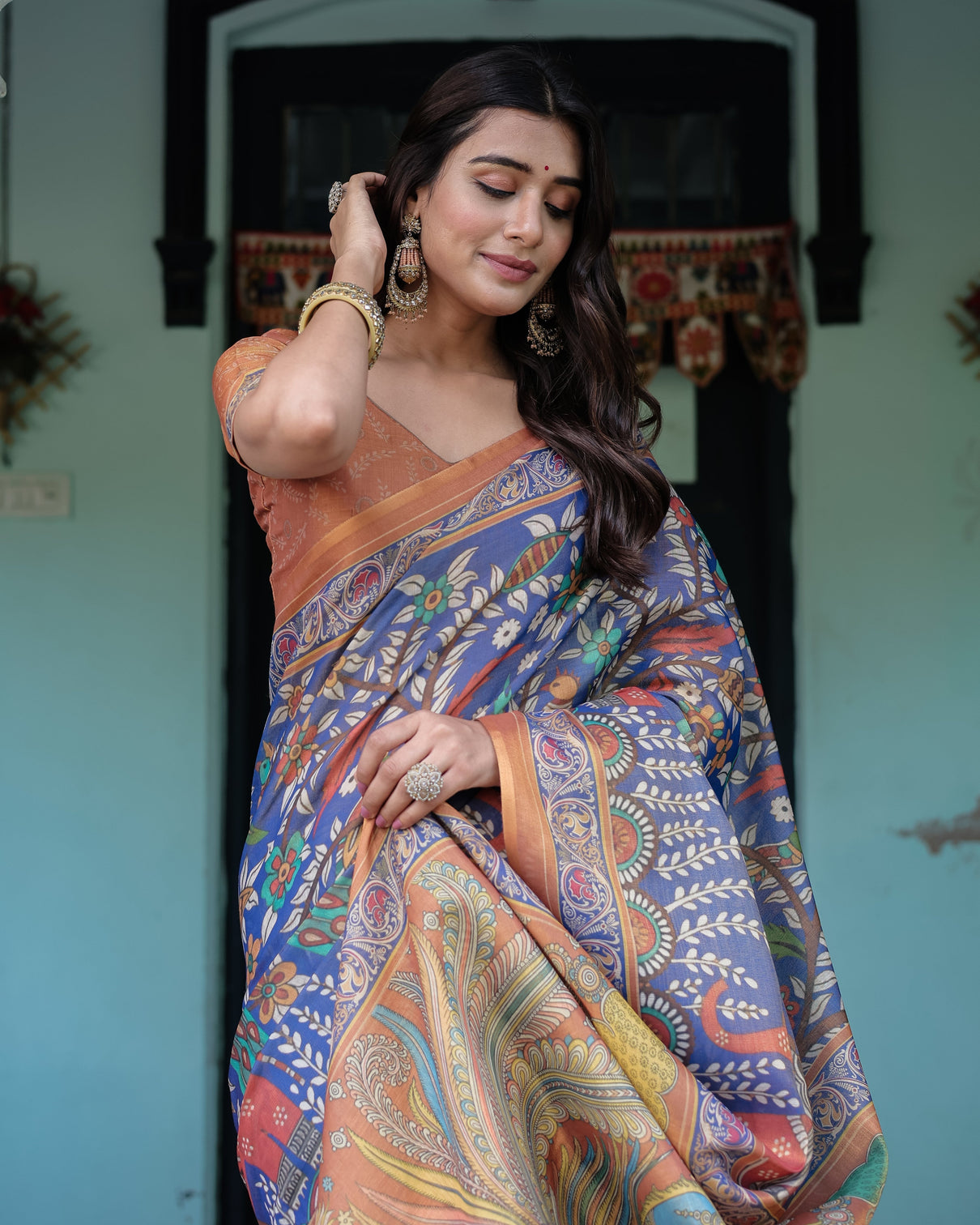 Royal blue rust handloom cotton saree with bold floral print grand peacock pallu