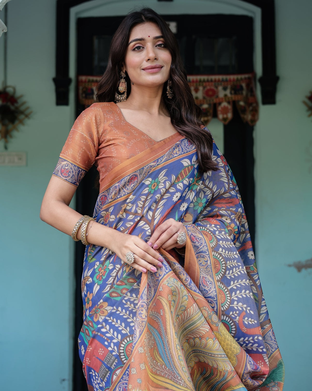 Royal blue rust handloom cotton saree with bold floral print grand peacock pallu