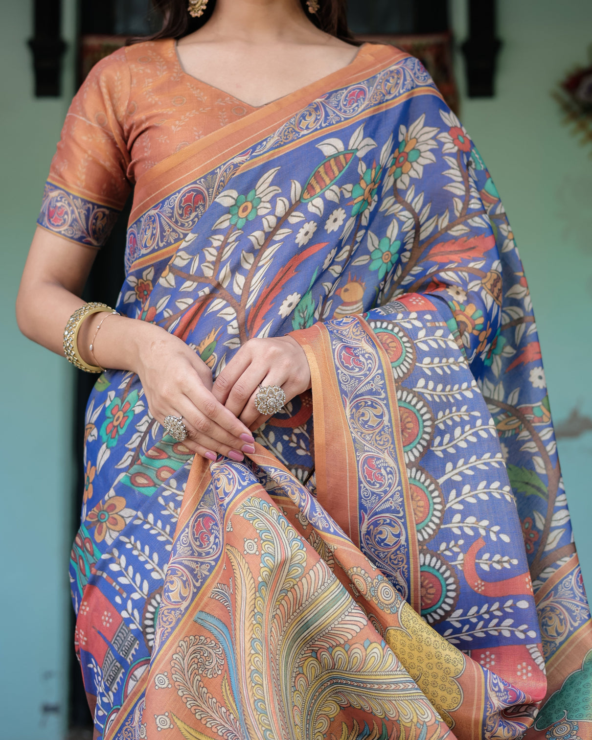 Royal blue rust handloom cotton saree with bold floral print grand peacock pallu