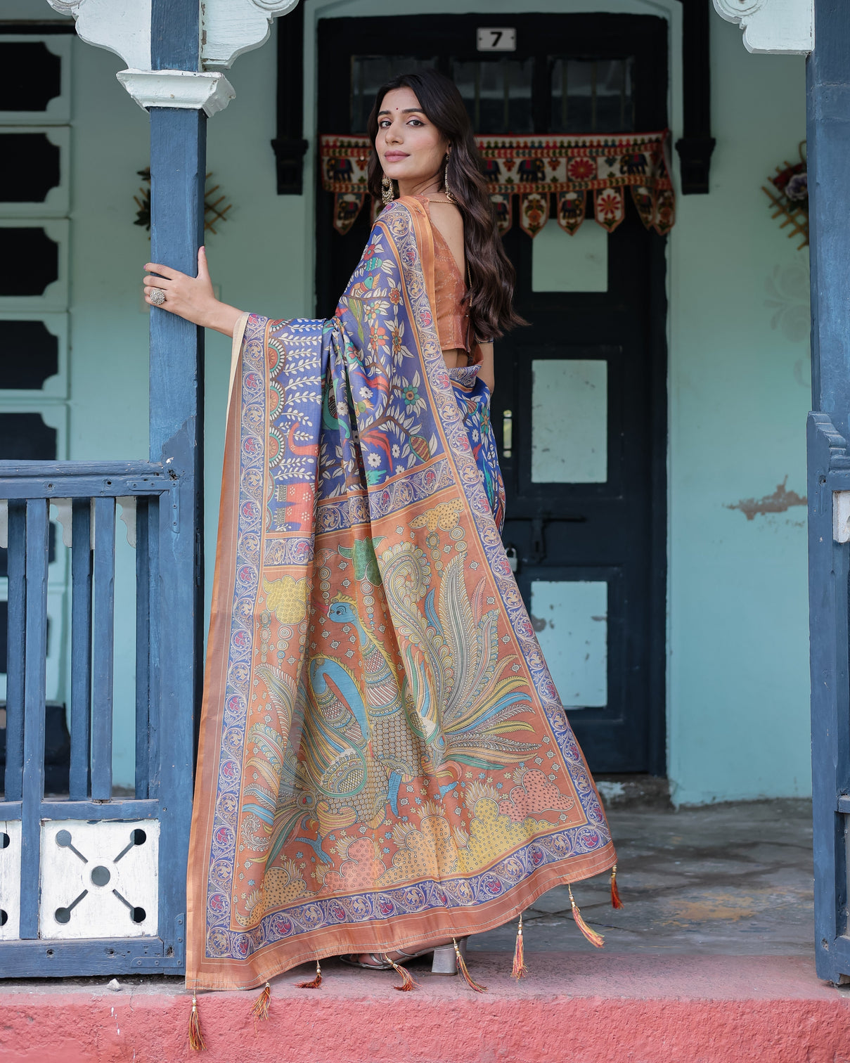 Royal blue rust handloom cotton saree with bold floral print grand peacock pallu