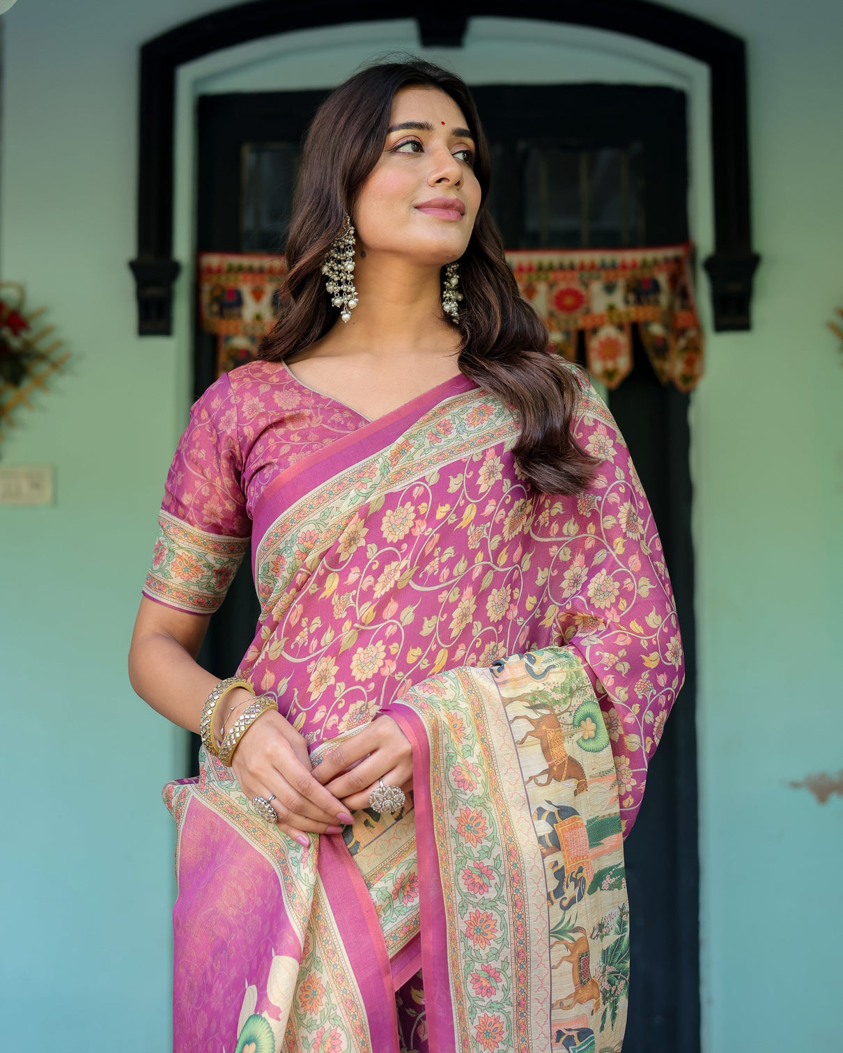 Magenta pink handloom cotton saree with floral vines royal elephant procession pallu