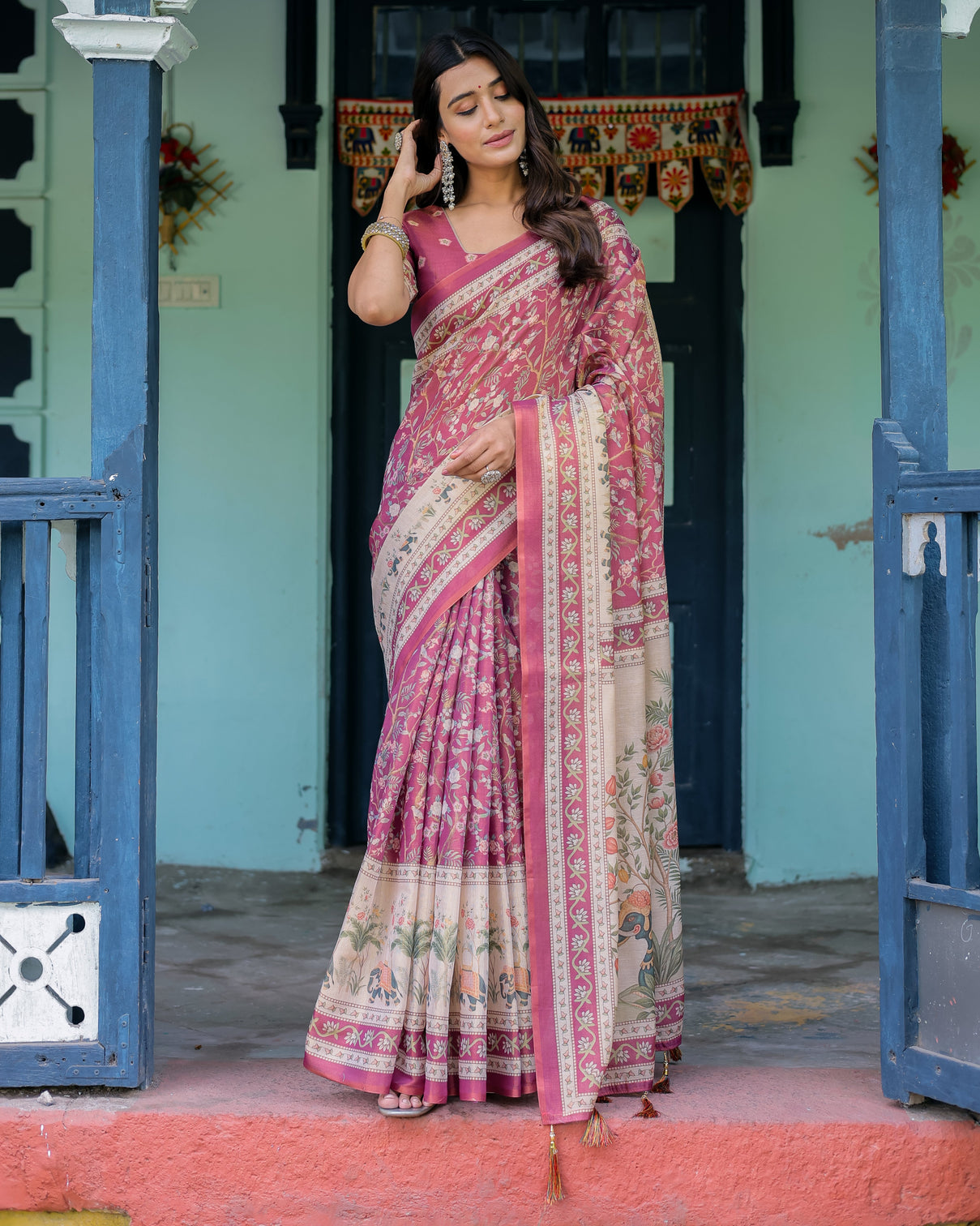 Rose pink handloom cotton saree with ivory elephant procession pallu floral print