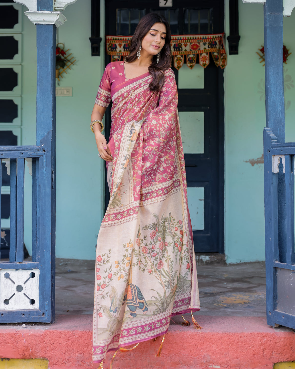 Rose pink handloom cotton saree with ivory elephant procession pallu floral print