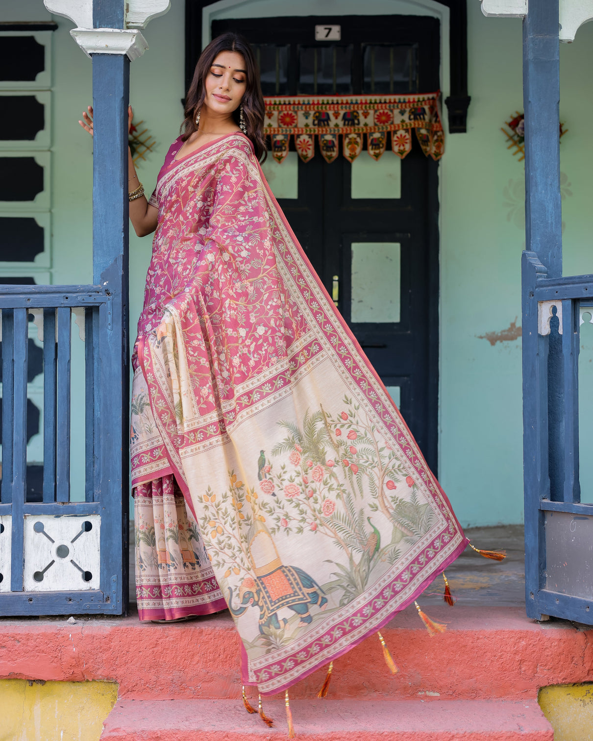 Rose pink handloom cotton saree with ivory elephant procession pallu floral print