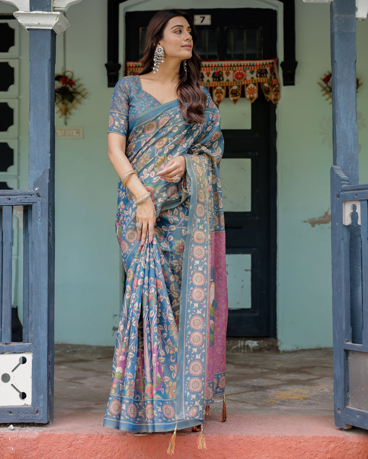 Dusty blue handloom cotton saree with floral print pink cow lotus motif pallu