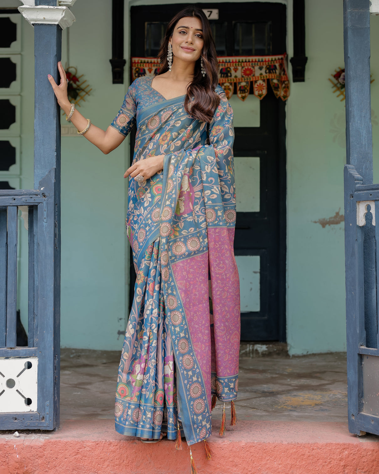 Dusty blue handloom cotton saree with floral print pink cow lotus motif pallu mameraa