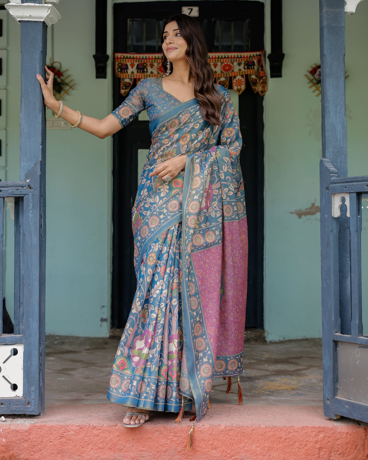 Dusty blue handloom cotton saree with floral print pink cow lotus motif pallu