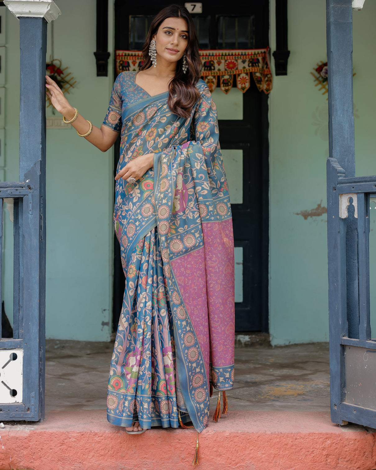 Dusty blue handloom cotton saree with floral print pink cow lotus motif pallu