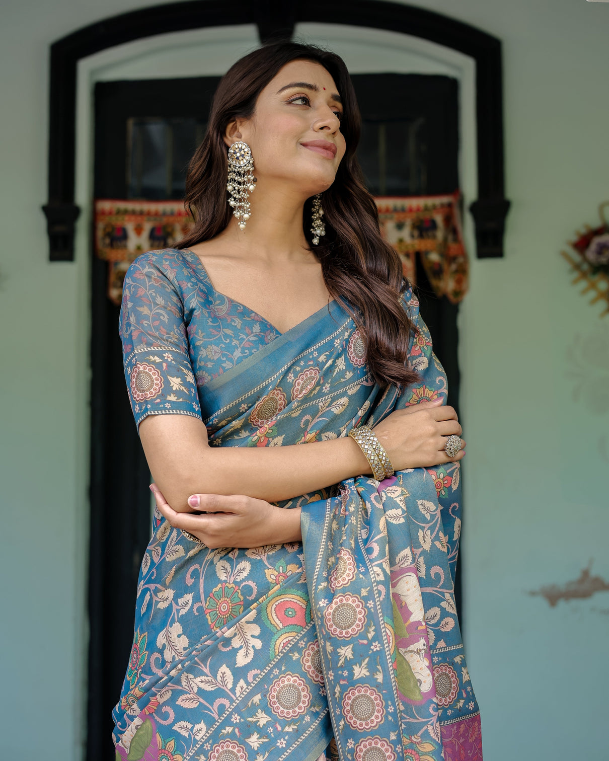 Dusty blue handloom cotton saree with floral print pink cow lotus motif pallu