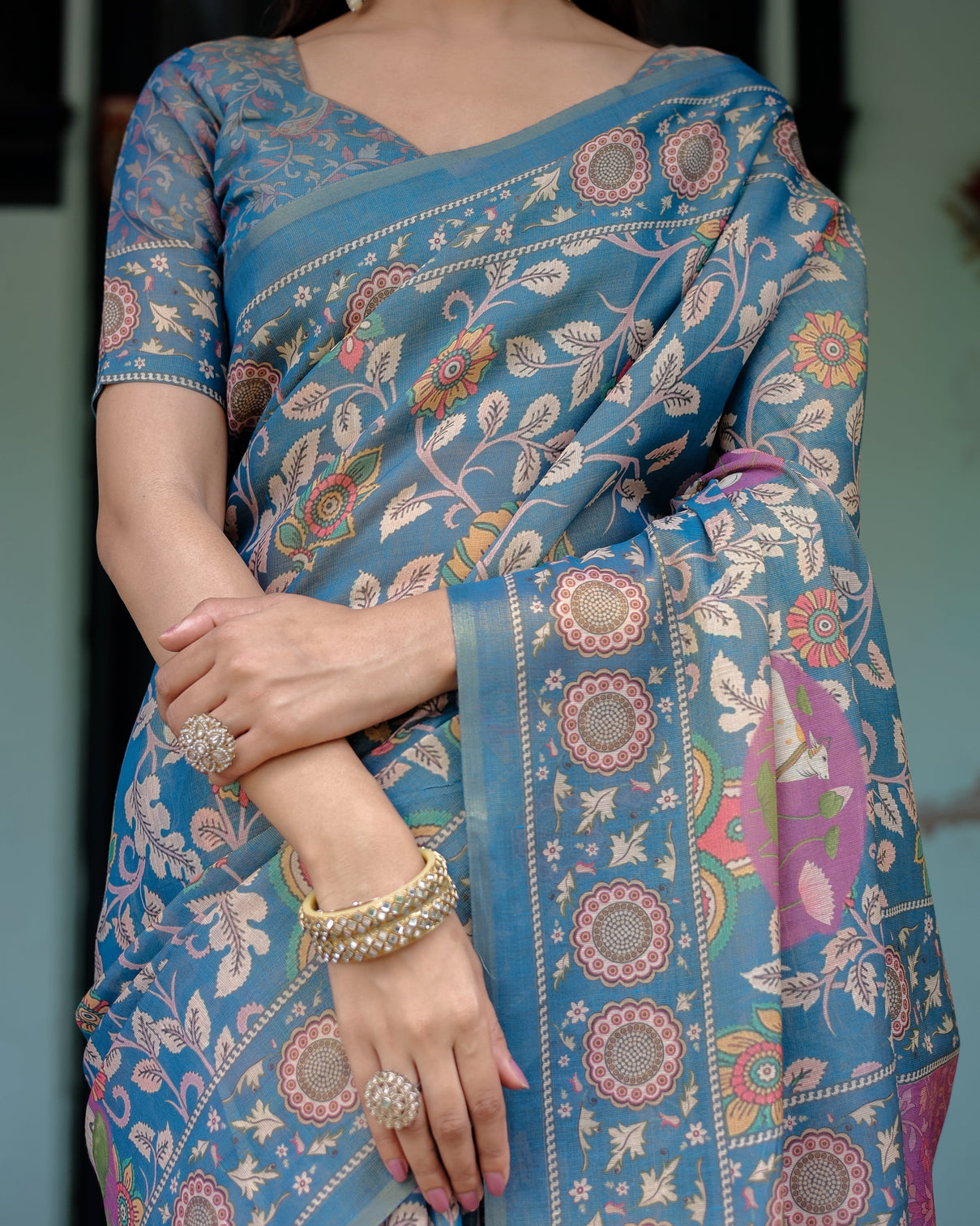 Dusty blue handloom cotton saree with floral print pink cow lotus motif pallu