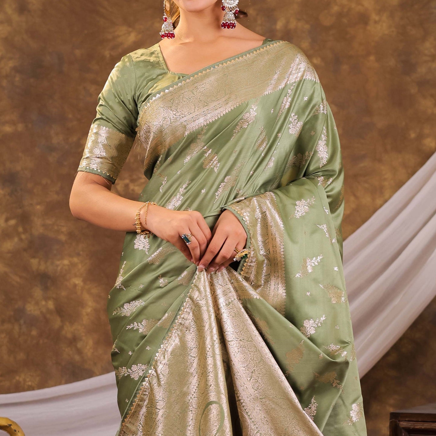 Sage Green Kanjivaram Banarasi Satin Silk Saree with Silver Zari Weaving, Designer Woven Pallu & Tassel Detailing
