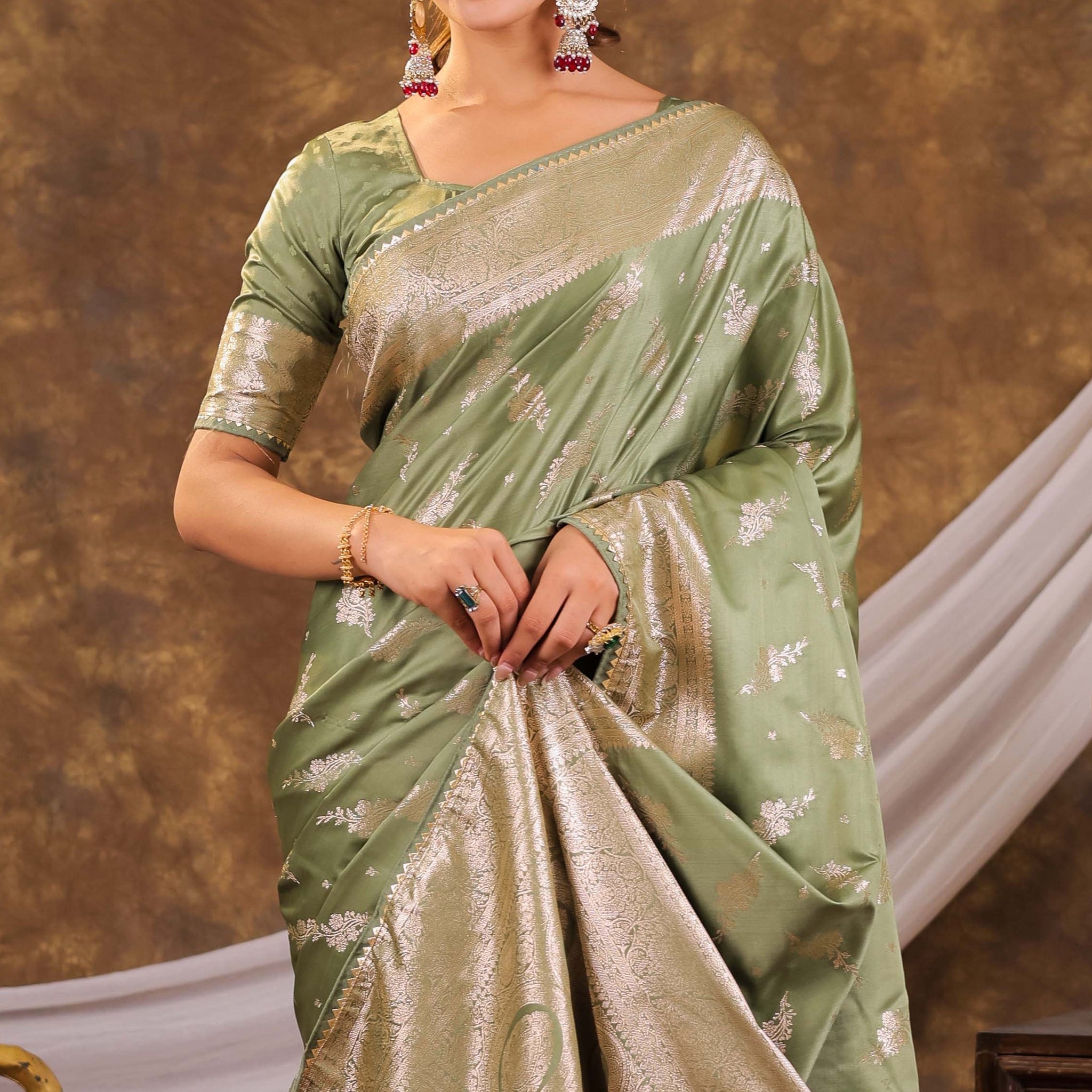 Sage Green Kanjivaram Banarasi Satin Silk Saree with Silver Zari Weaving, Designer Woven Pallu & Tassel Detailing