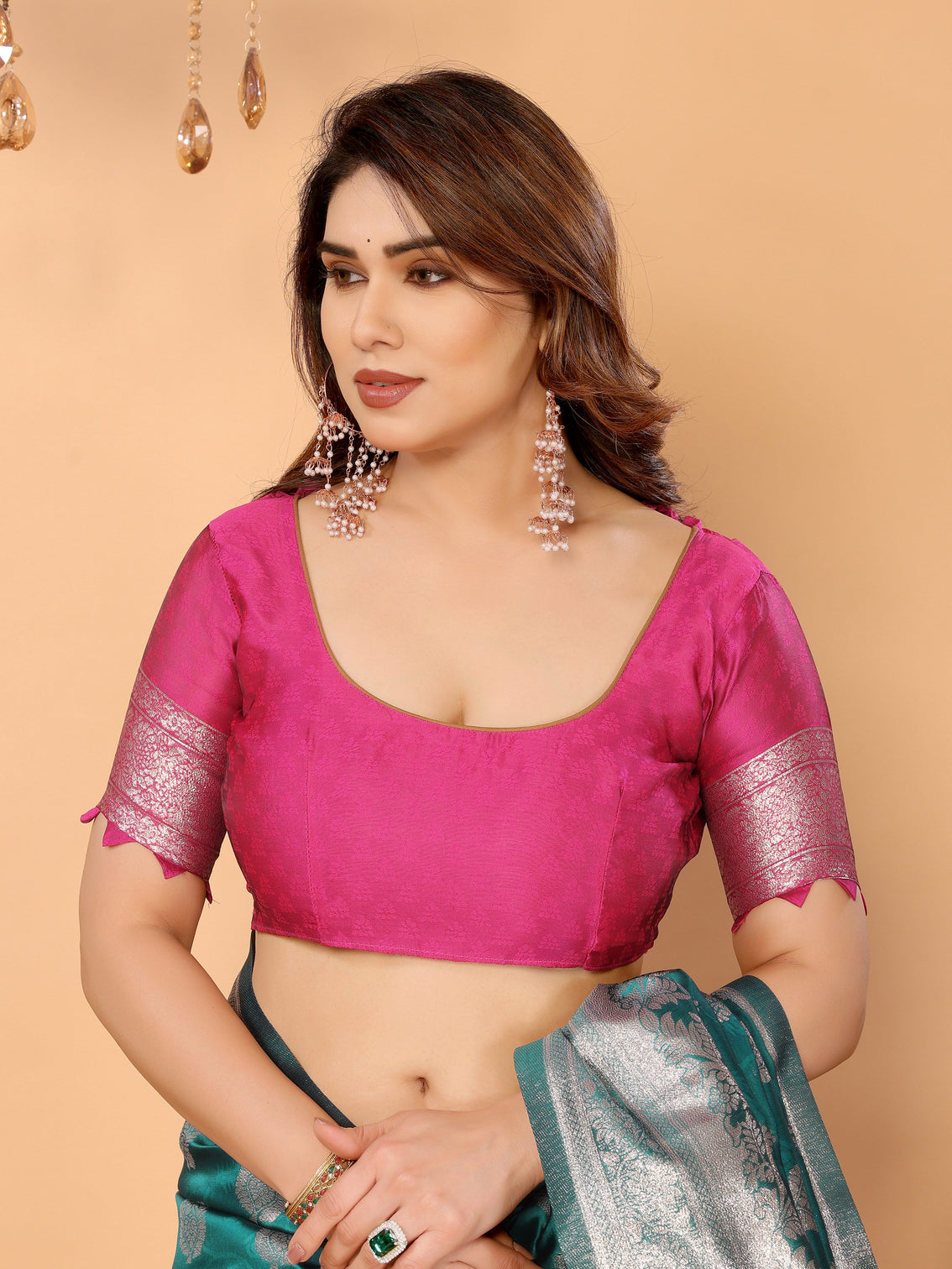 Teal green banarasi silk saree with silver zari butta pink pallu traditional wedding festive wear