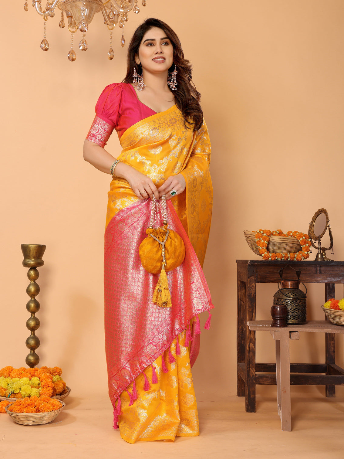 Traditional yellow banarasi silk saree with pink zari border and blouse festive traditional wear