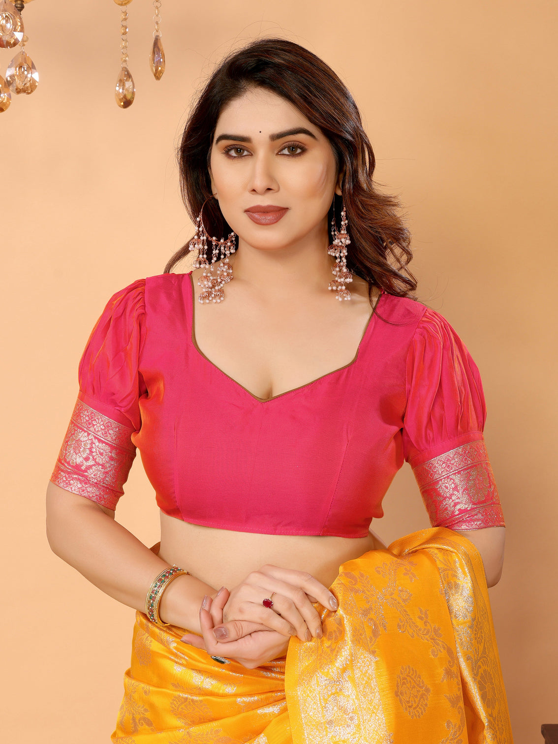 Traditional yellow banarasi silk saree with pink zari border and blouse festive traditional wear
