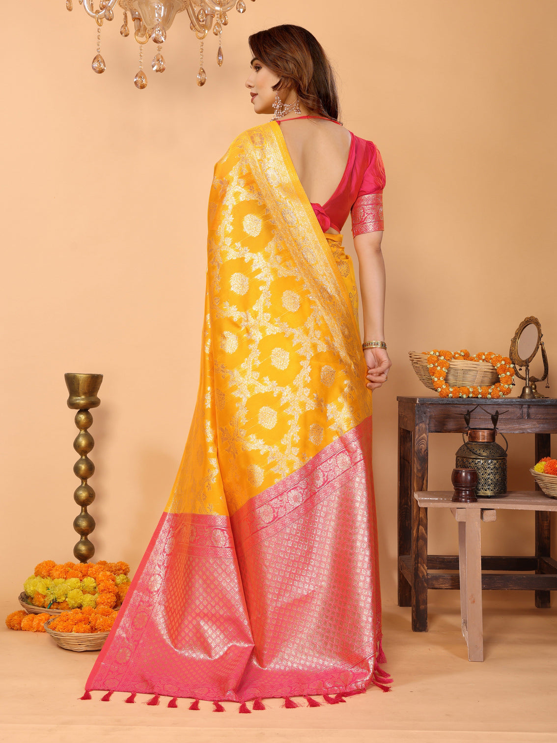 Traditional yellow banarasi silk saree with pink zari border and blouse festive traditional wear