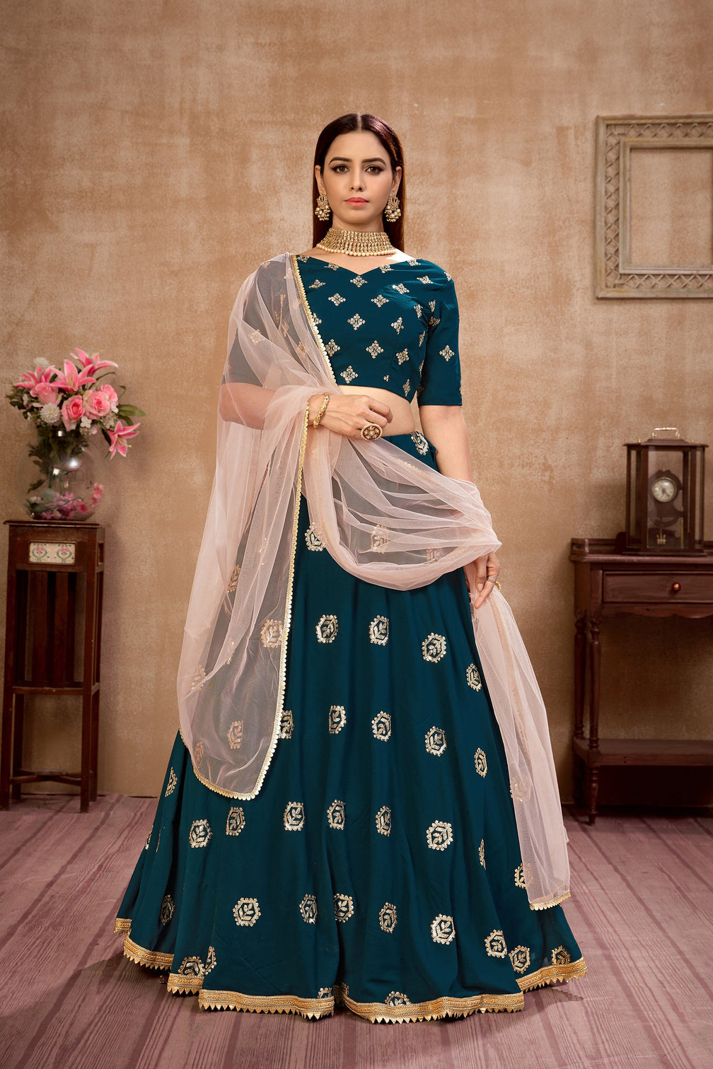 Peacock Blue Georgette Lehenga Choli With Net Dupatta