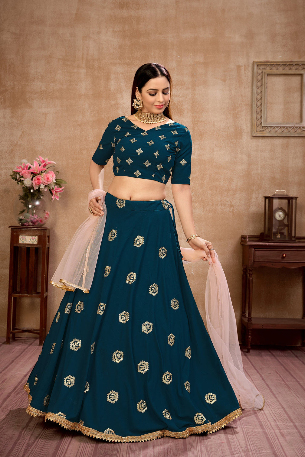 Peacock Blue Georgette Lehenga Choli With Net Dupatta