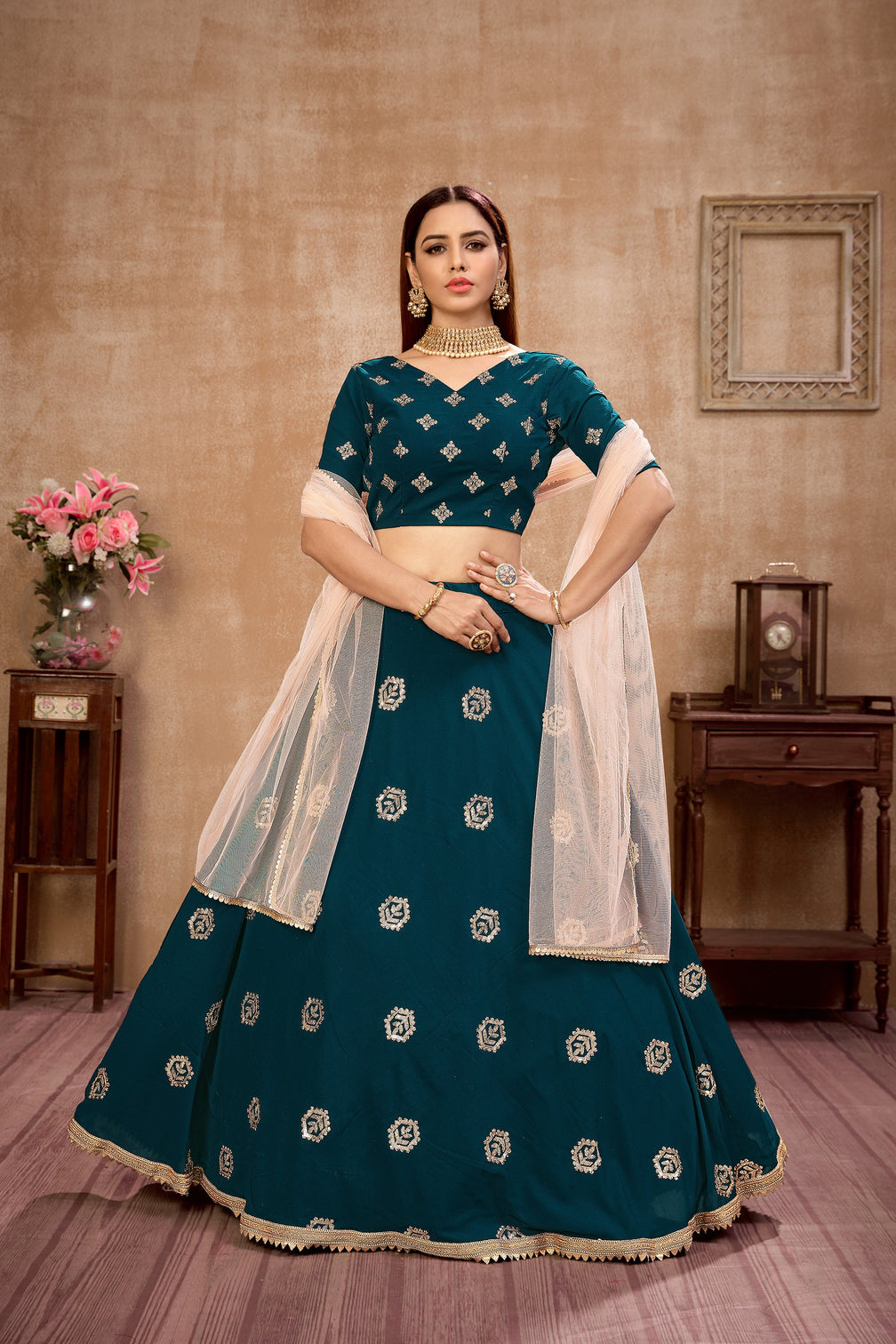 Peacock Blue Georgette Lehenga Choli With Net Dupatta